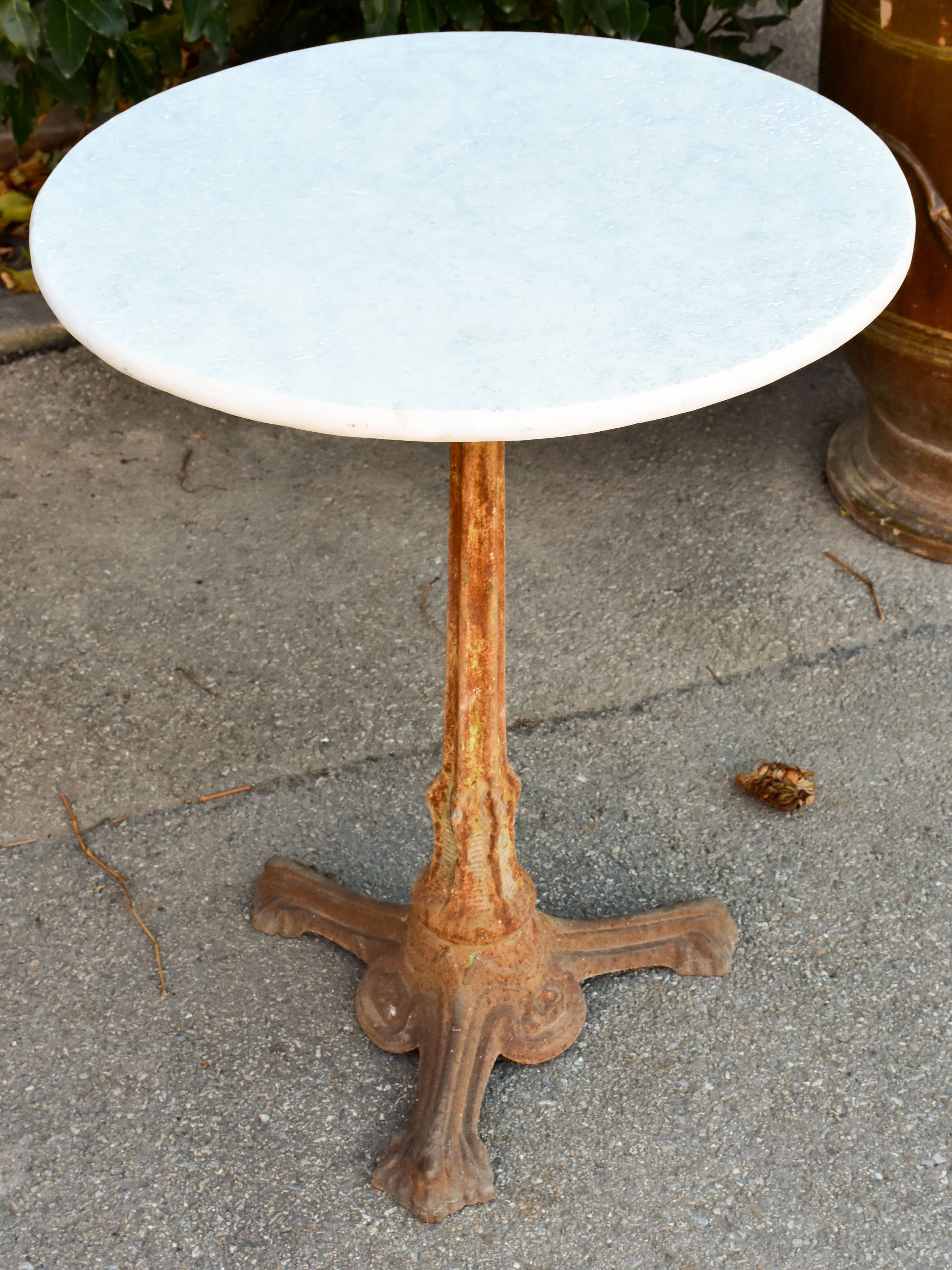 Antique Spanish bistro tables with marble tops