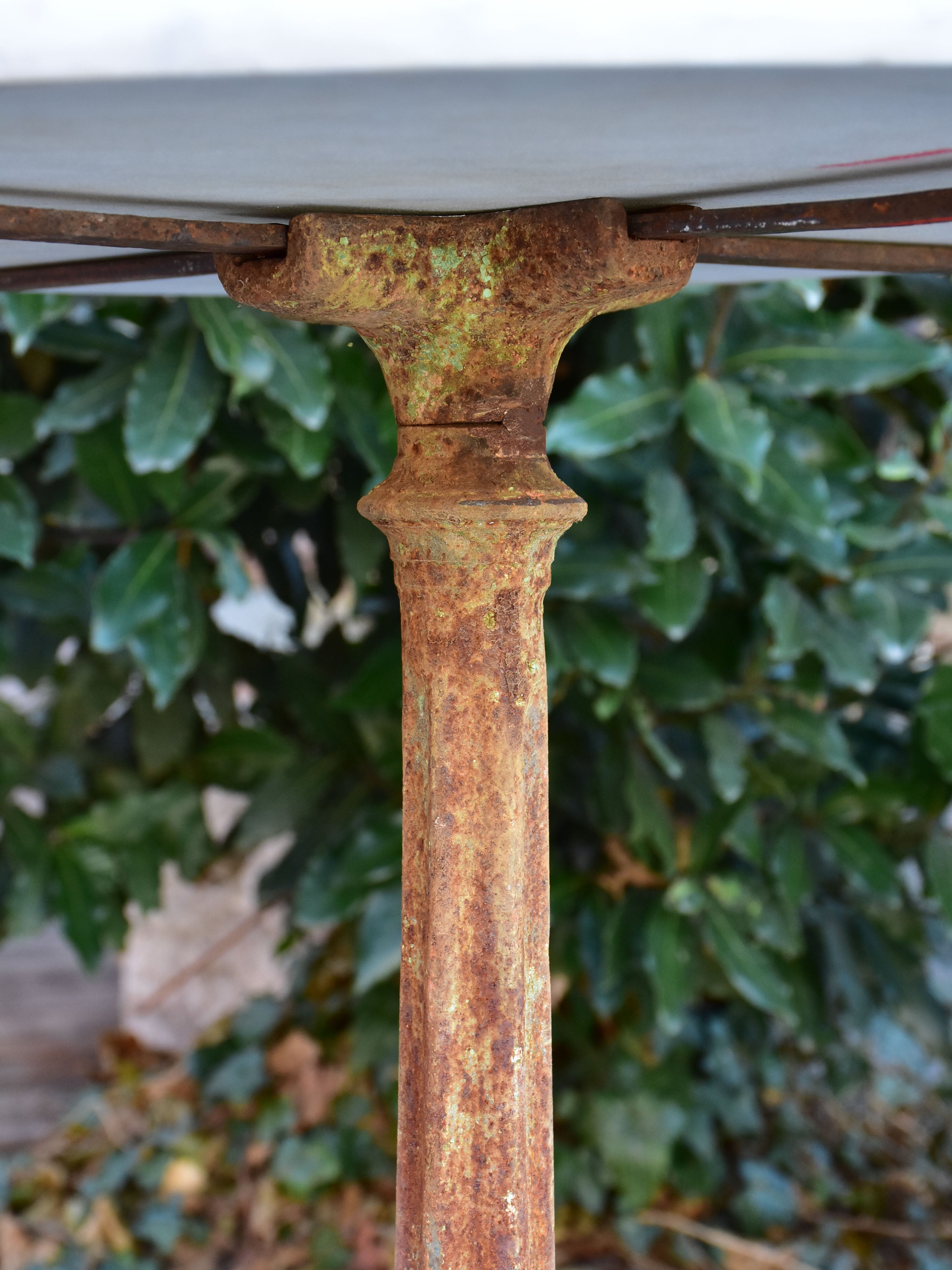 Antique Spanish bistro tables with marble tops