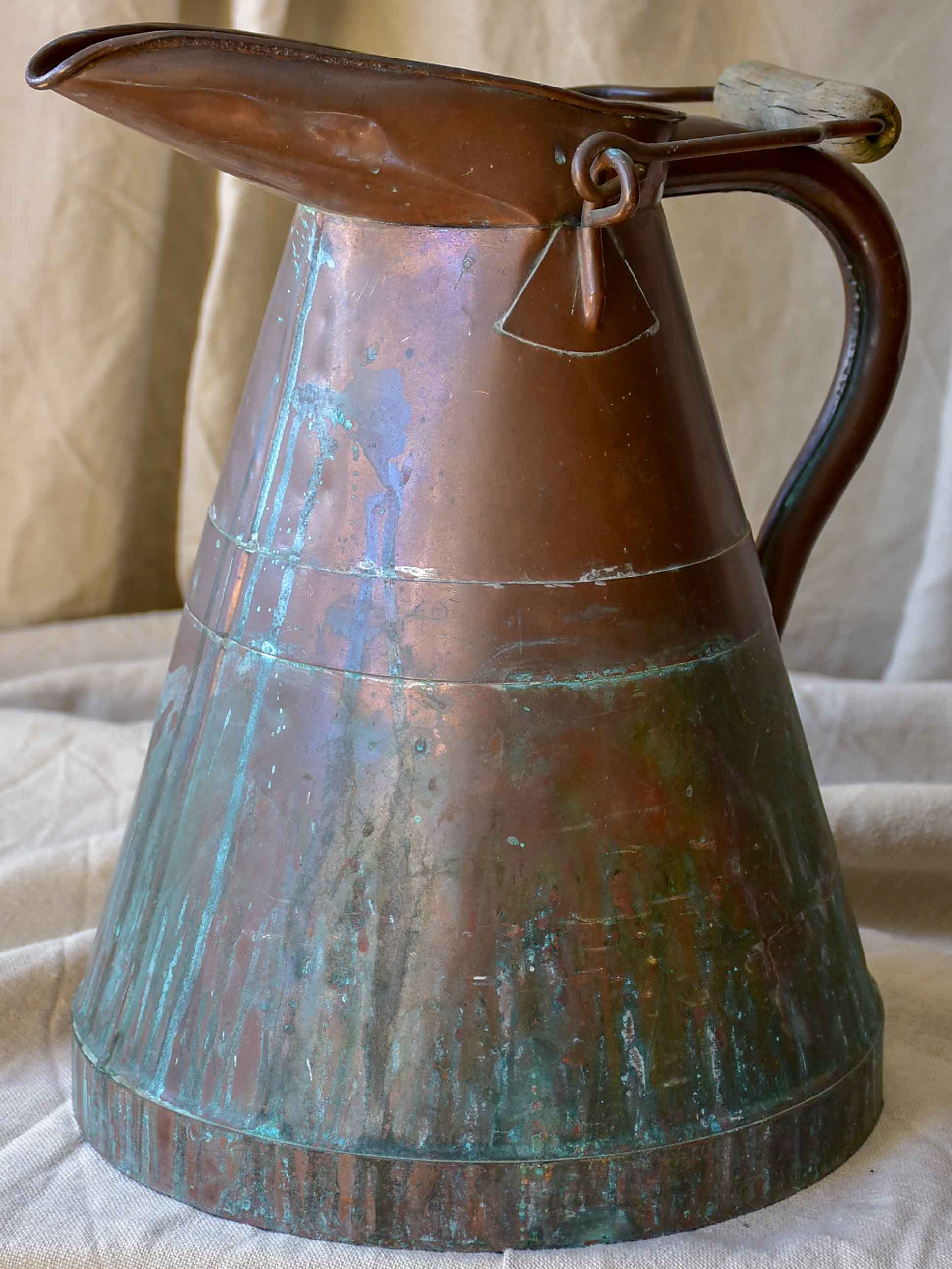 Antique French copper water pitcher with wooden handle