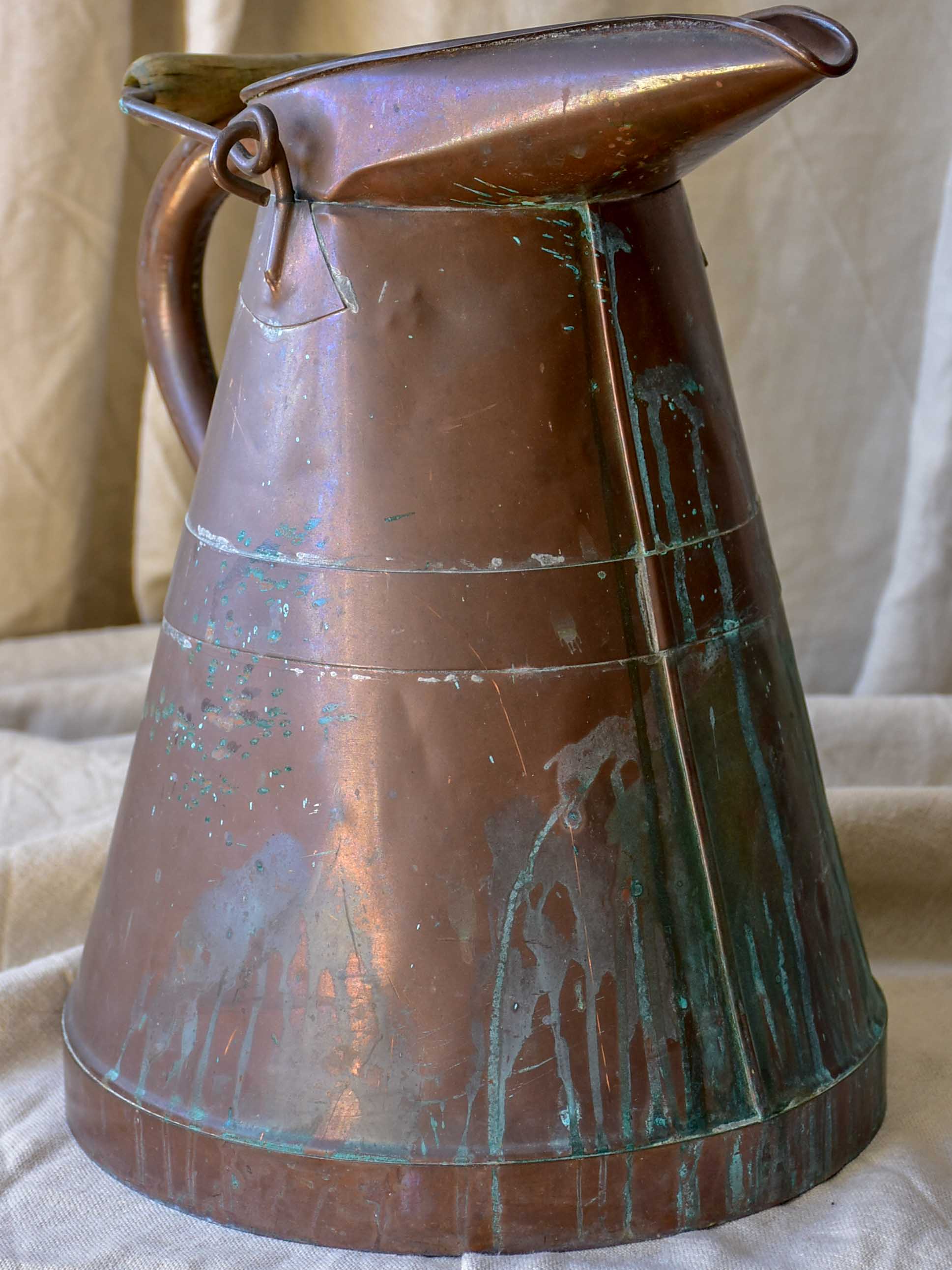 Antique French copper water pitcher with wooden handle