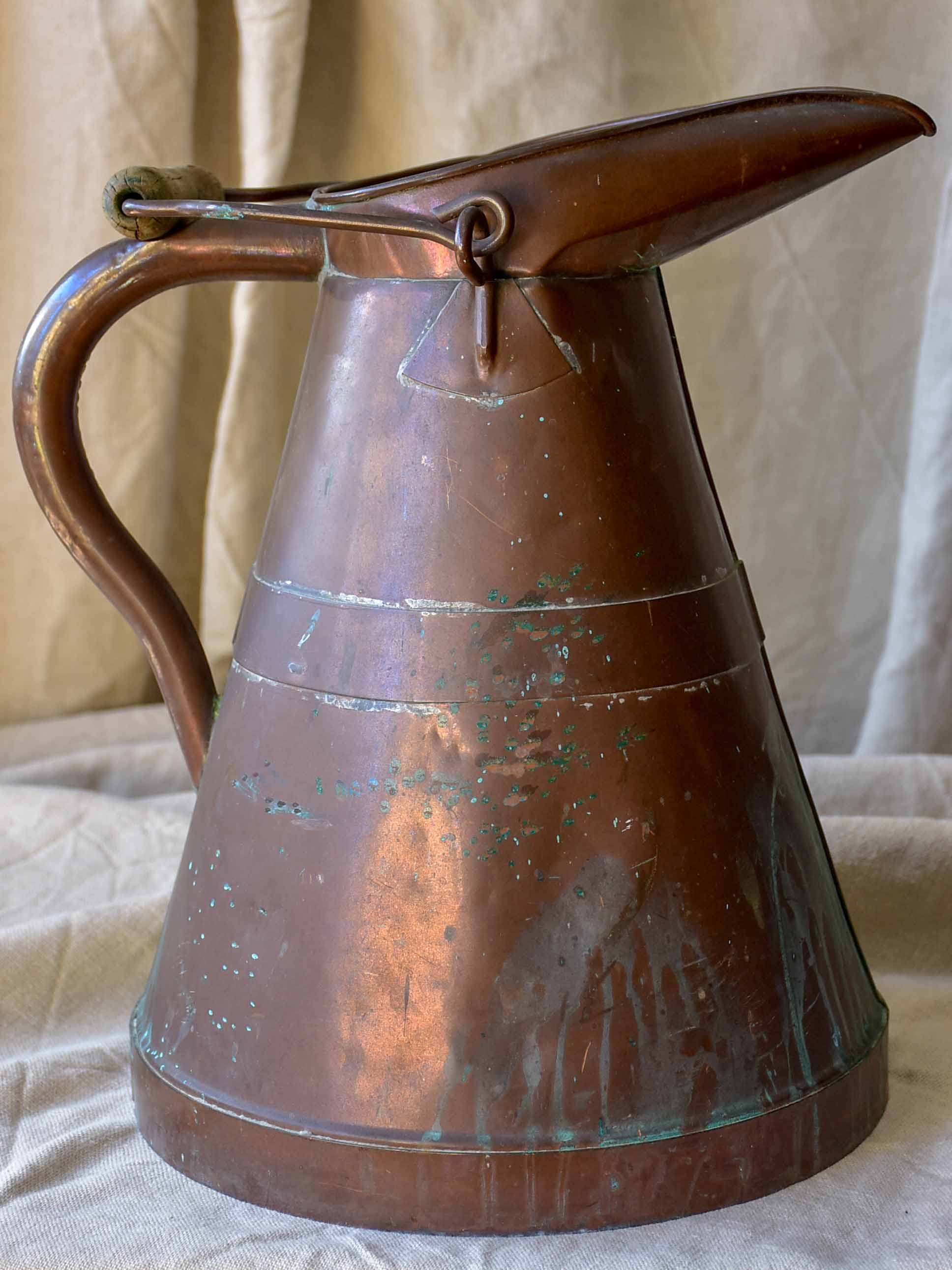 Antique French copper water pitcher with wooden handle