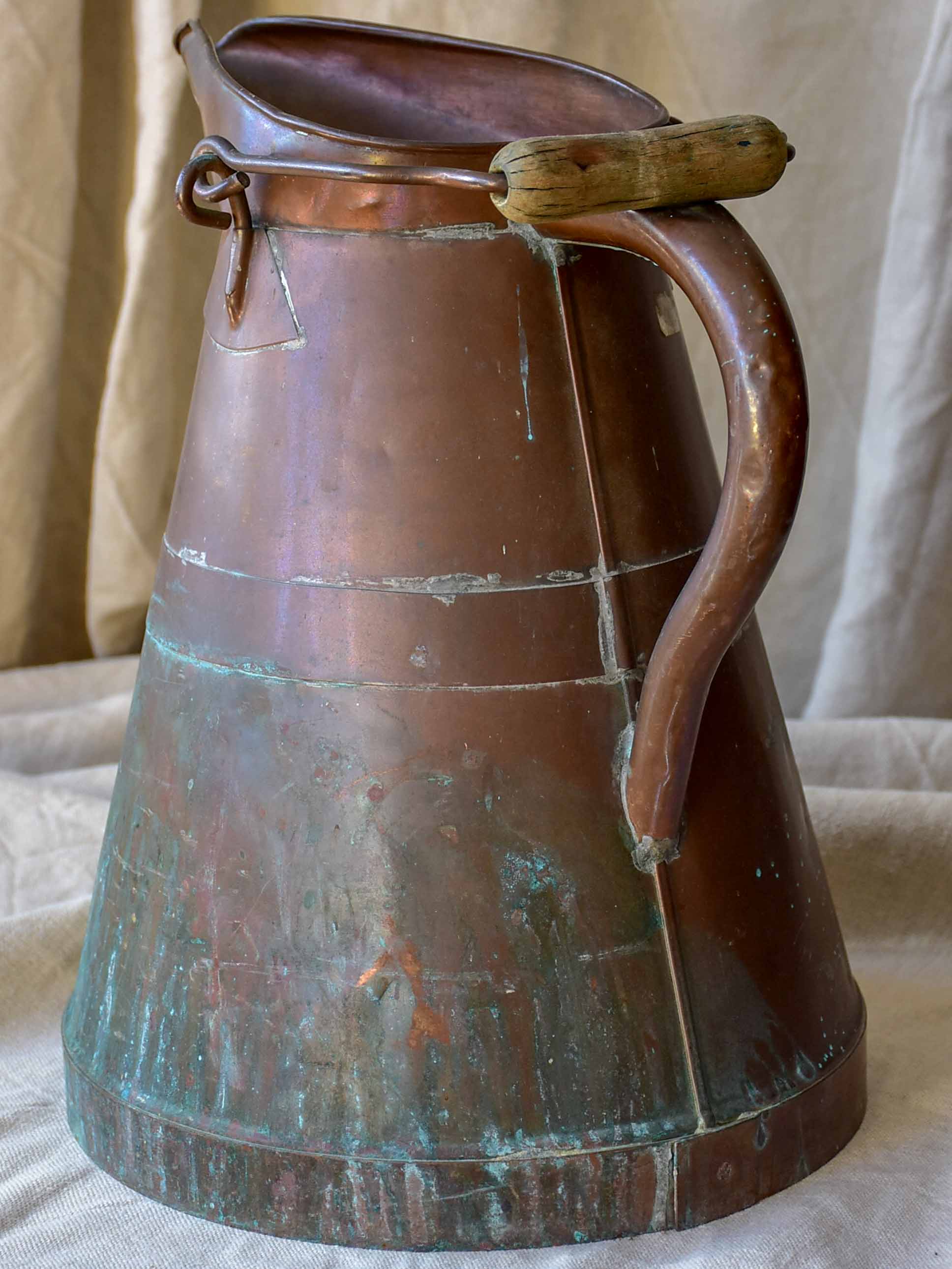 Antique French copper water pitcher with wooden handle