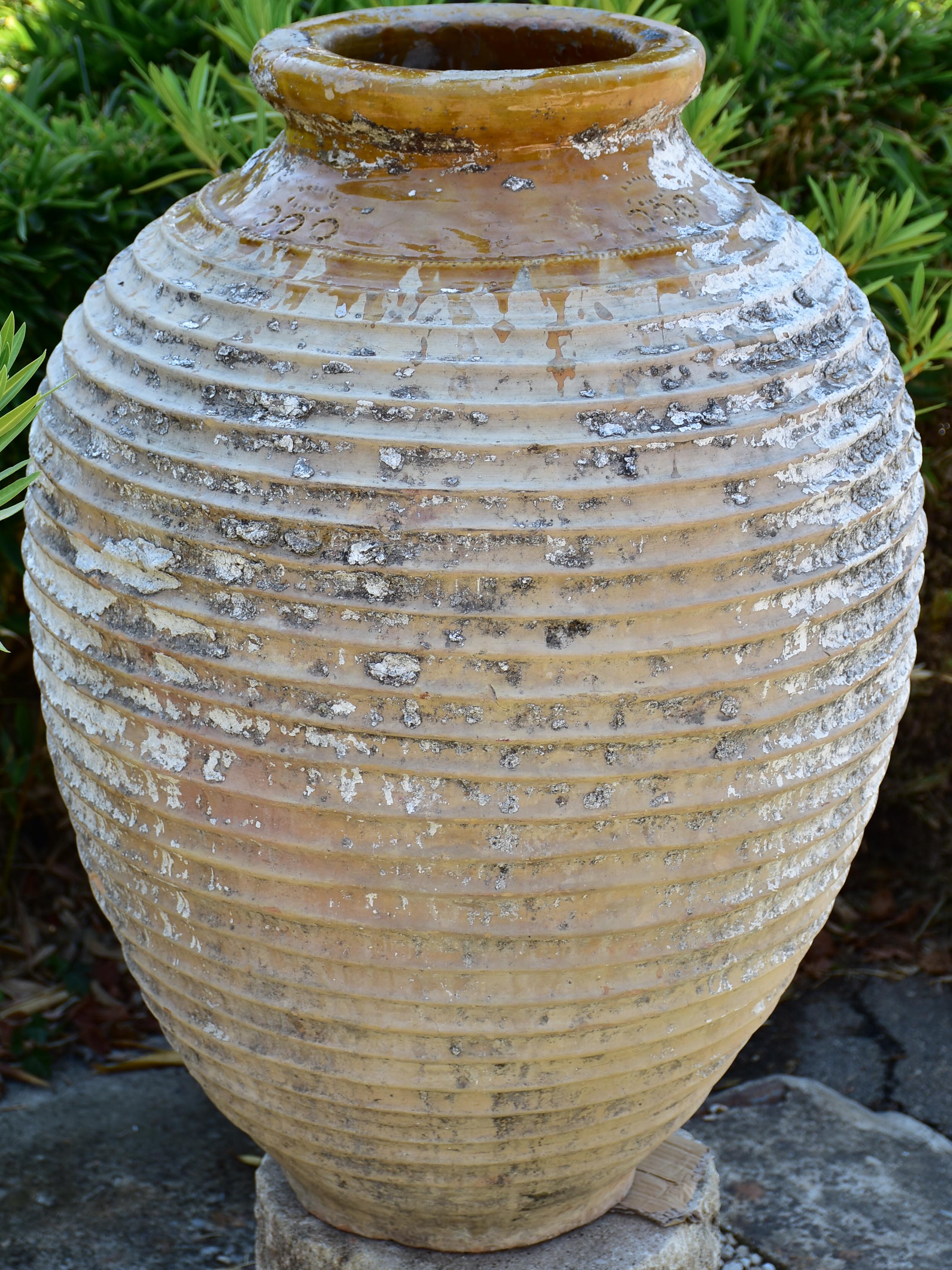 19th century Greek oil jar with white patina