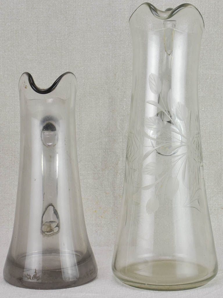 Two blown glass bistro cider pitchers