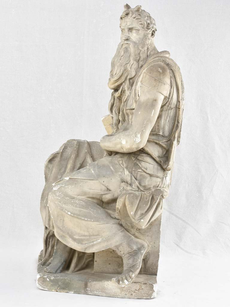 Intricate Moses sculpture in distressed condition