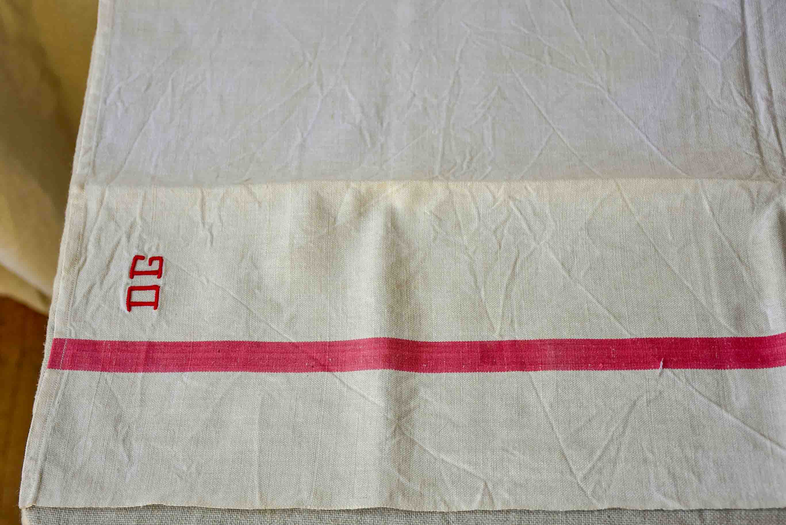 Antique French tea towel with DG monogram