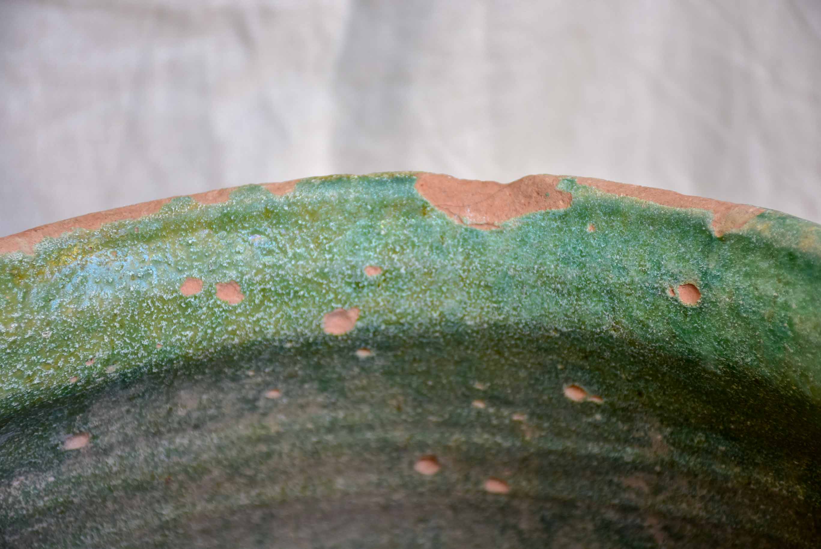 Antique French amphora pot with green glaze and four handles