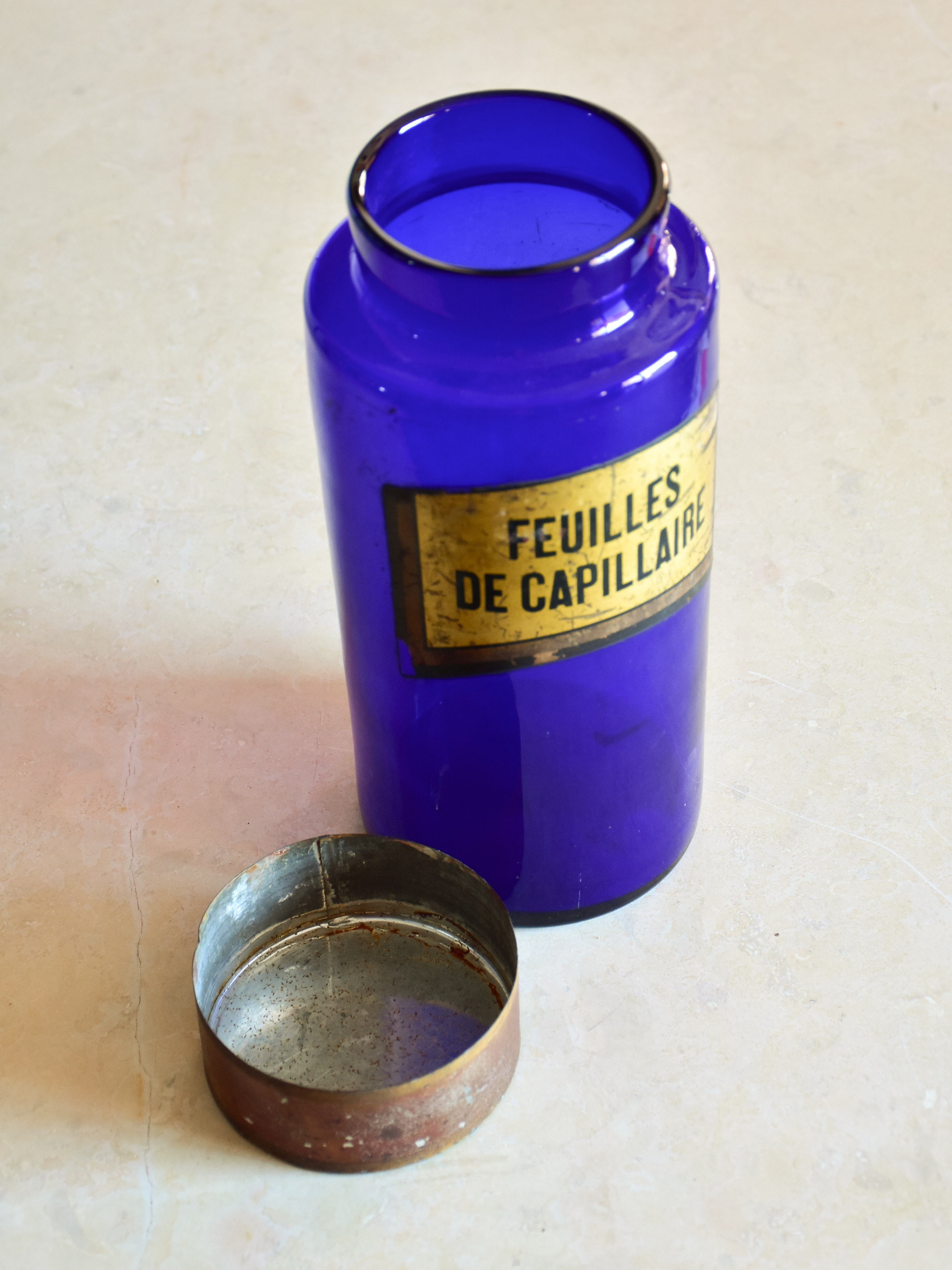 Collection of 14 antique French pharmacy jars with blue glass