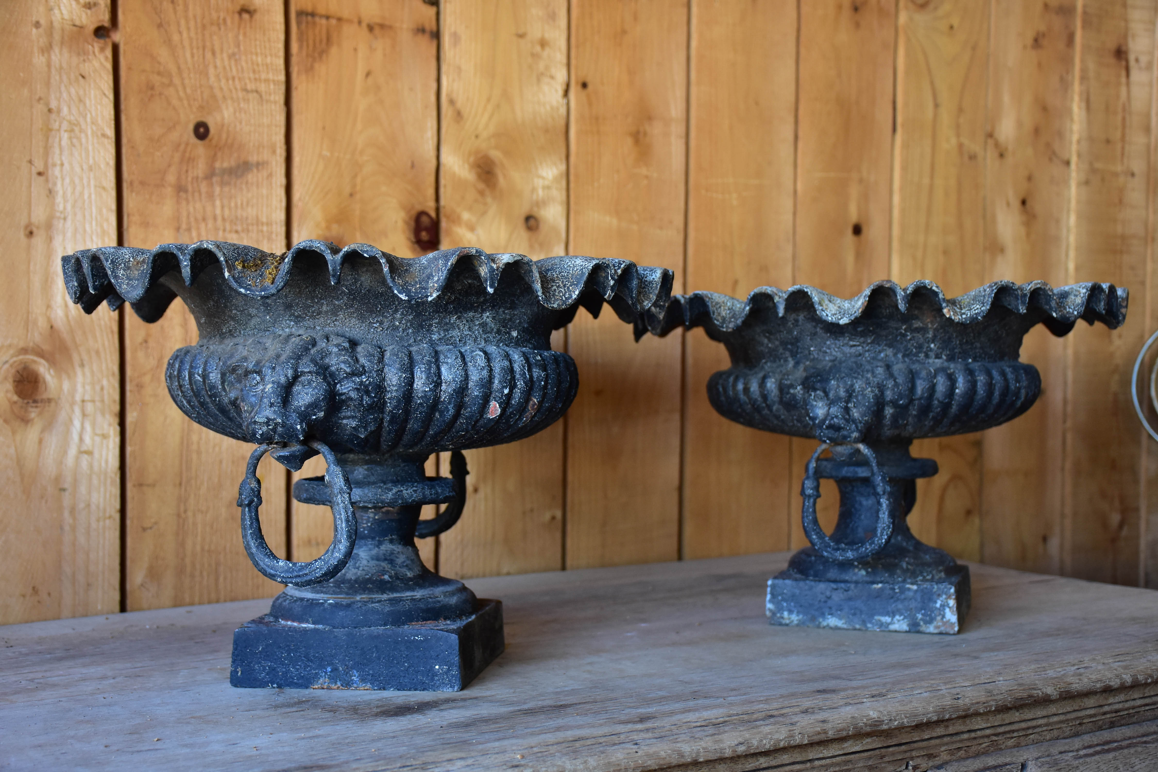 Pair of antique French garden planters with black patina