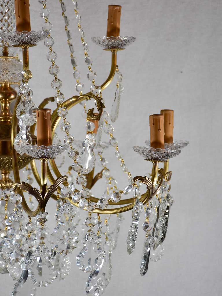 Pair of large crystal and brass chandeliers with 15 lights from the 1940's 35½" diameter