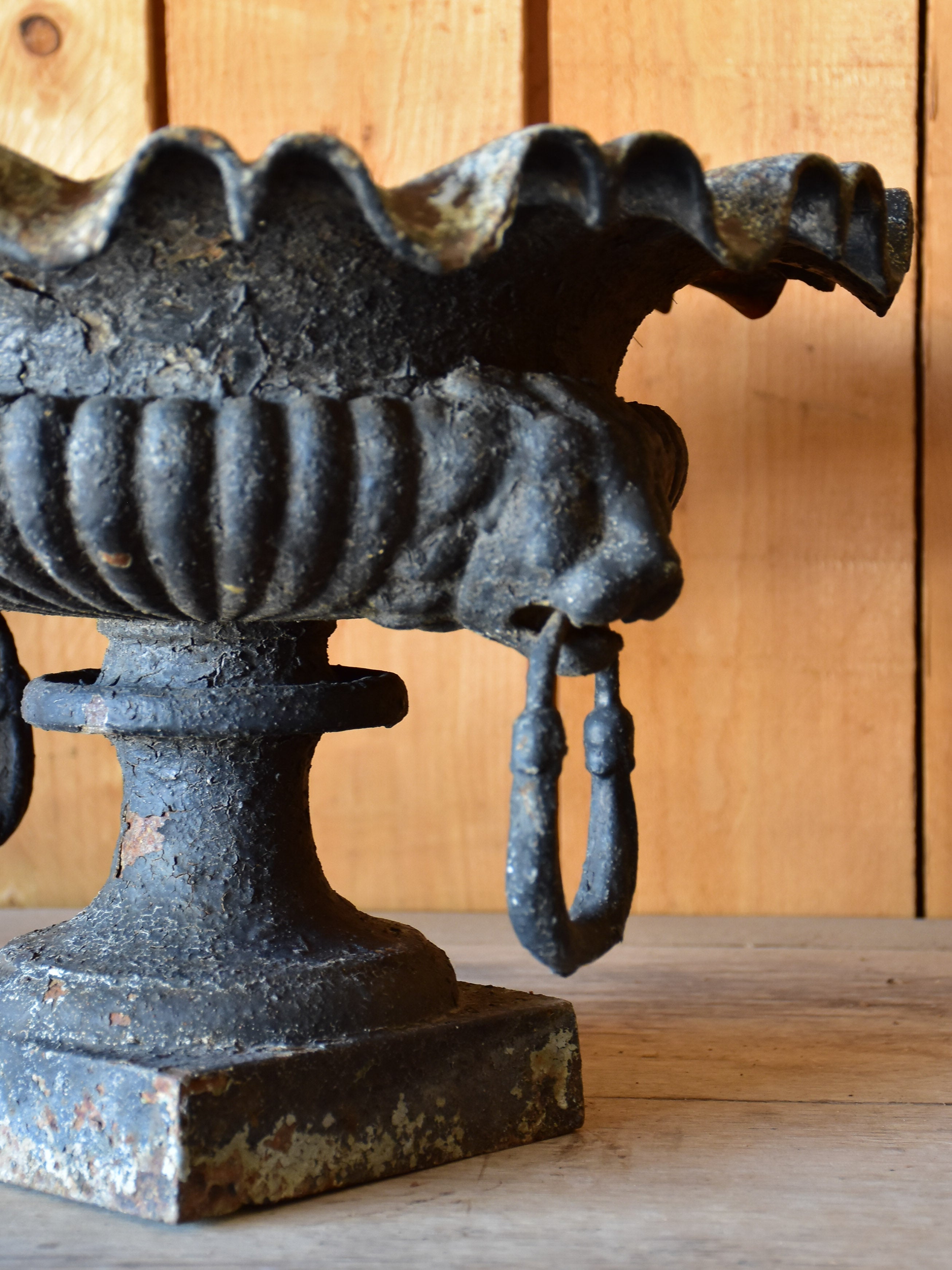 Pair of antique French garden planters with black patina