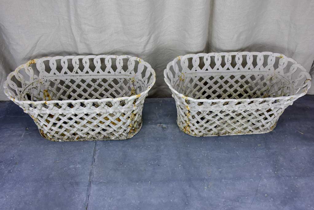 Pair of antique French woven iron plant stands