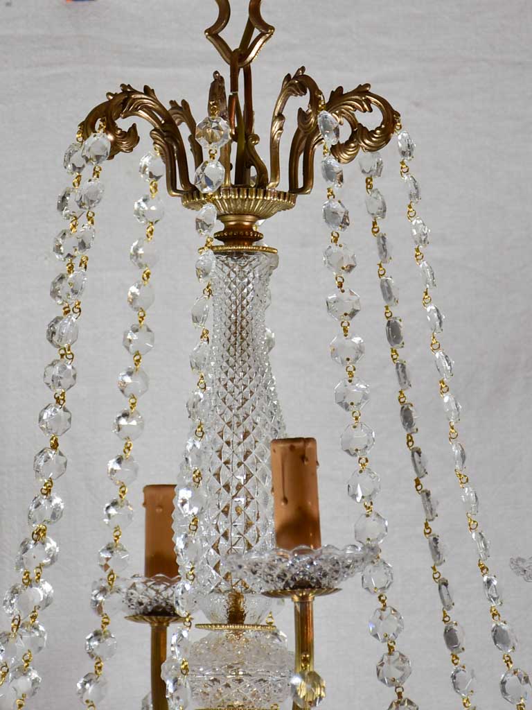 Pair of large crystal and brass chandeliers with 15 lights from the 1940's 35½" diameter