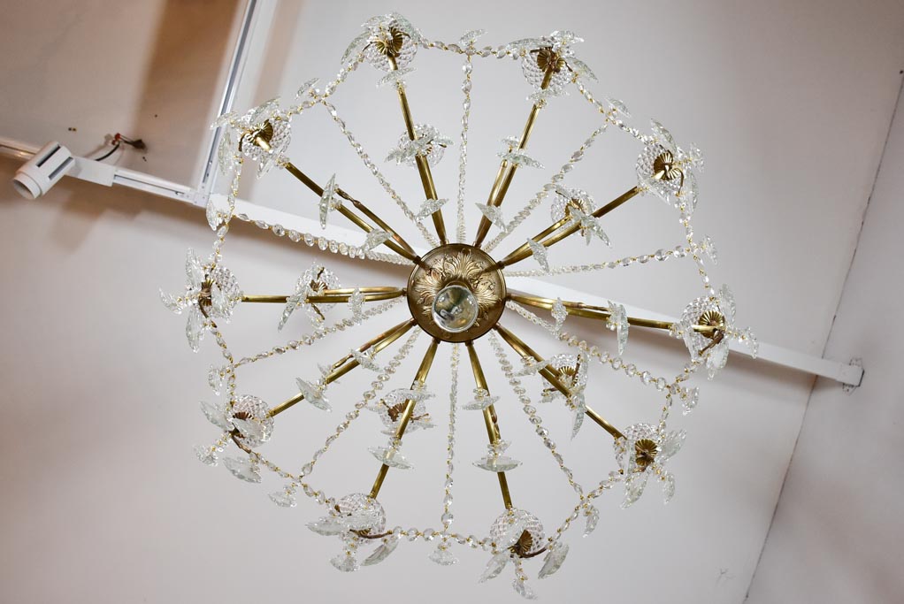 Pair of large crystal and brass chandeliers with 15 lights from the 1940's 35½" diameter