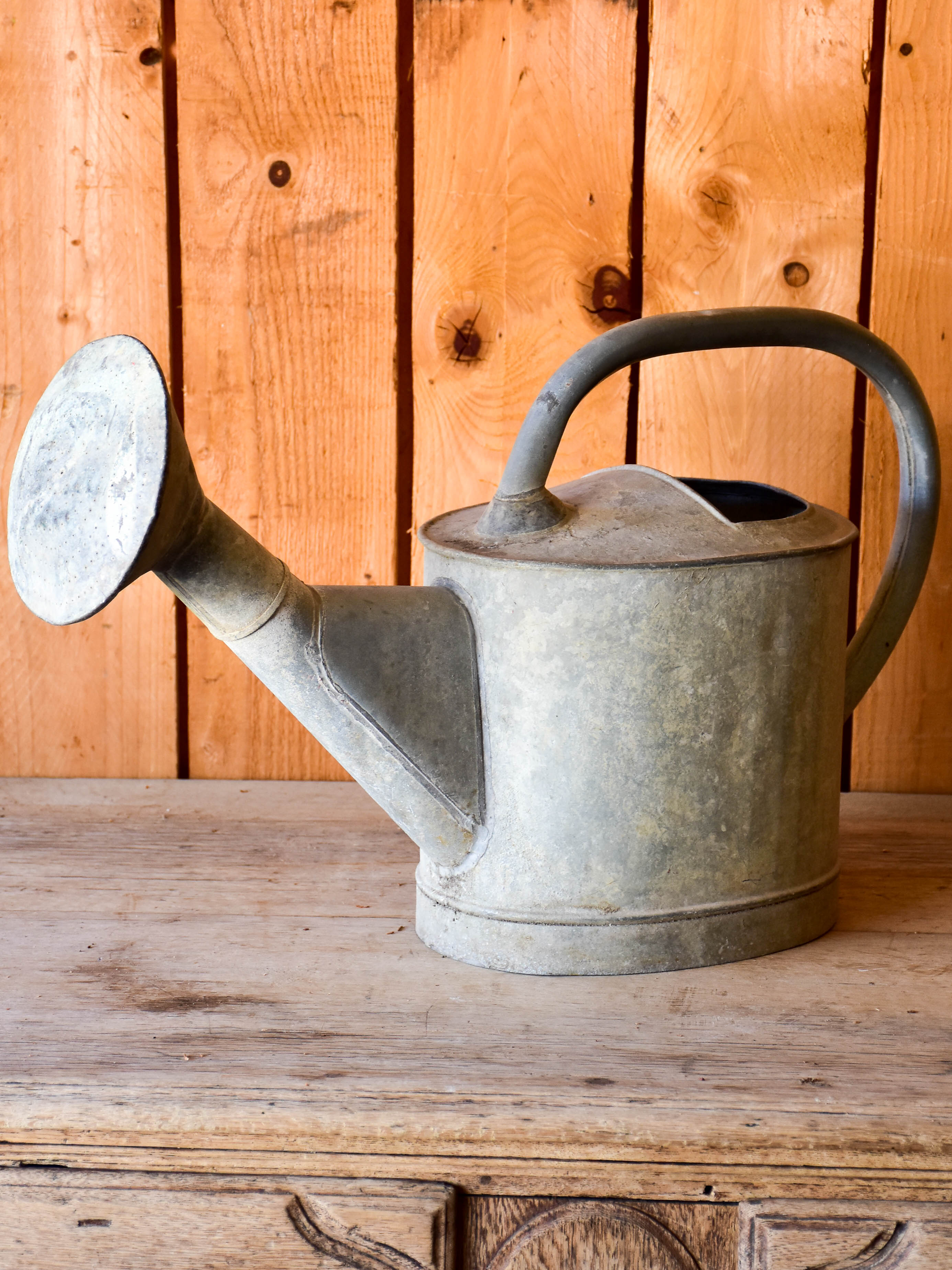 Antique French watering can with large rose head