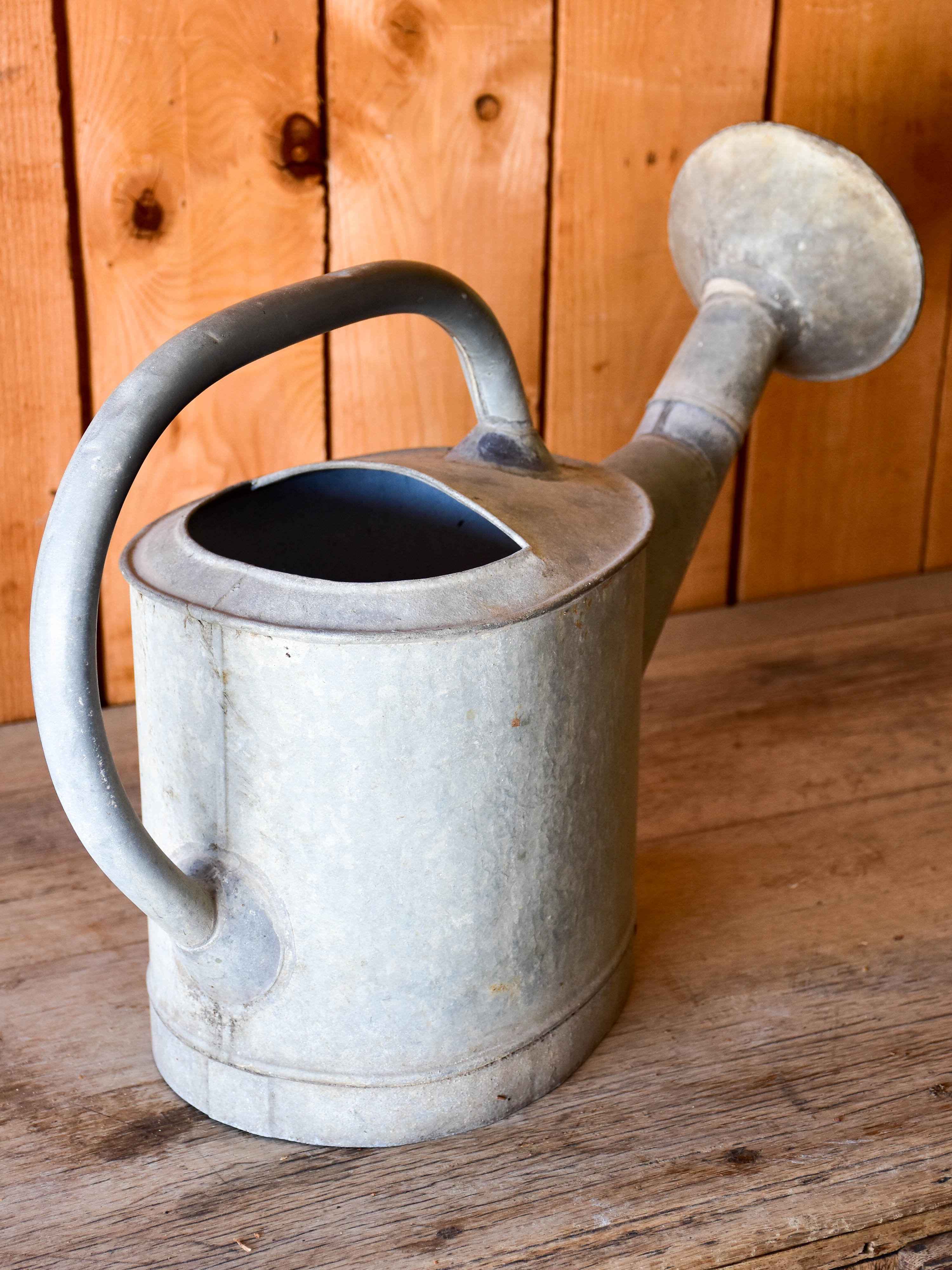 Antique French watering can with large rose head