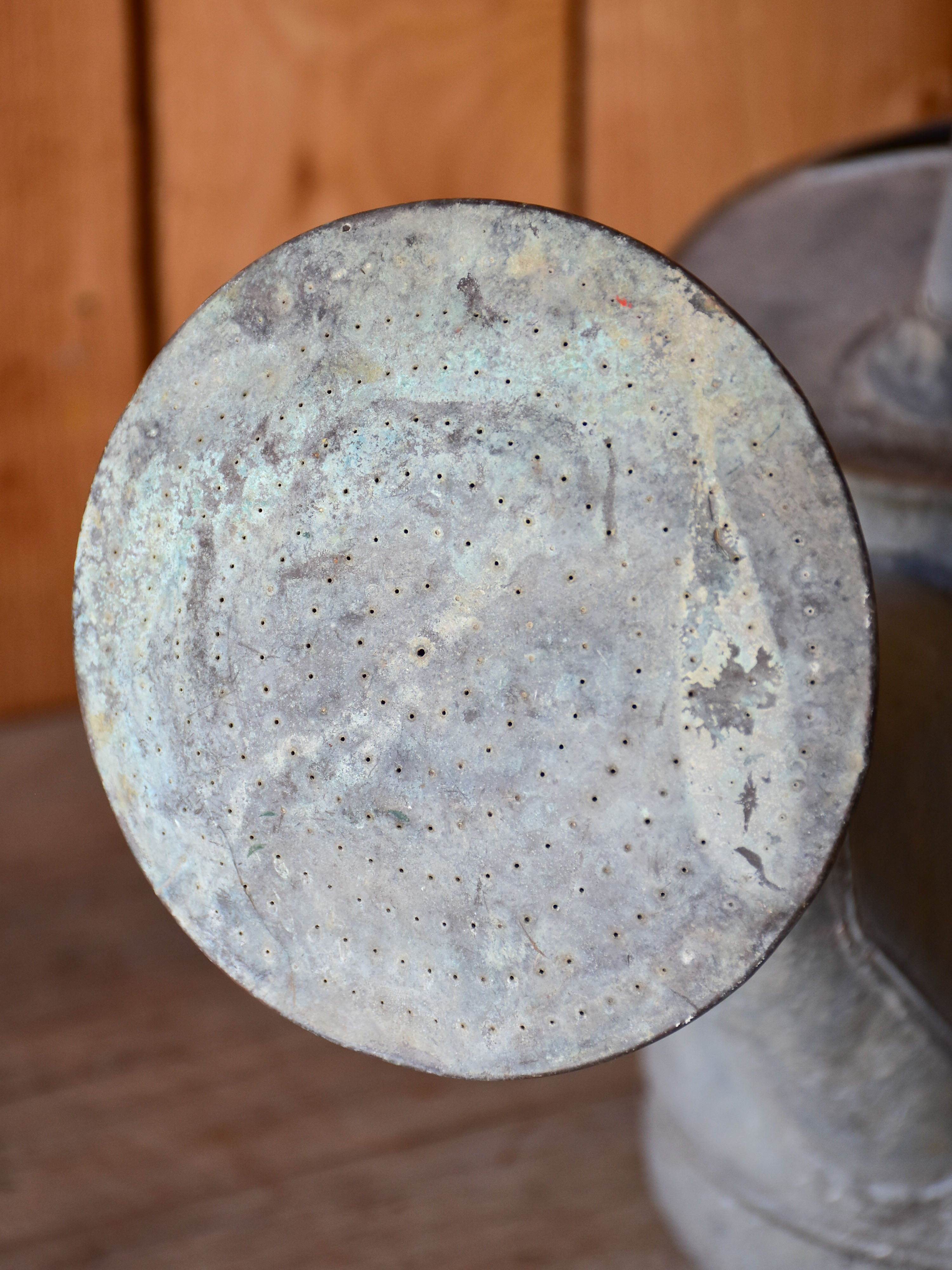 Antique French watering can with large rose head