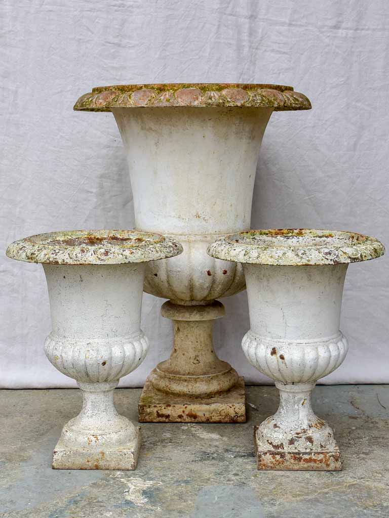 Pair of antique French cast iron Medici urns - white