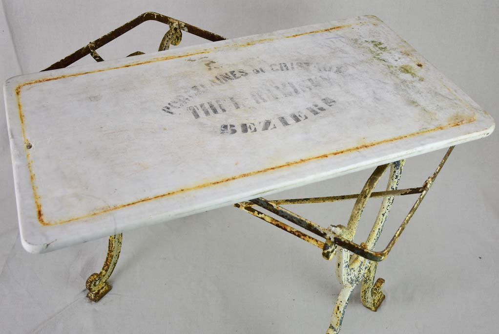 Early 20th Century rectangular garden table with marble top and patinated cast iron base 19¾" x 35½"