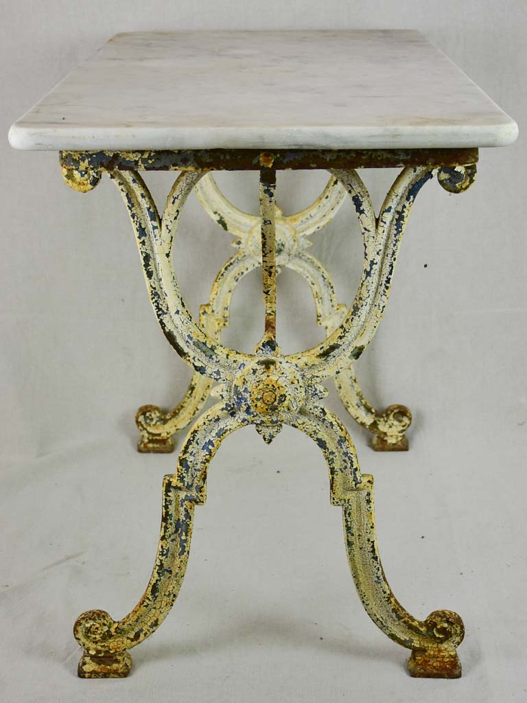 Early 20th Century rectangular garden table with marble top and patinated cast iron base 19¾" x 35½"