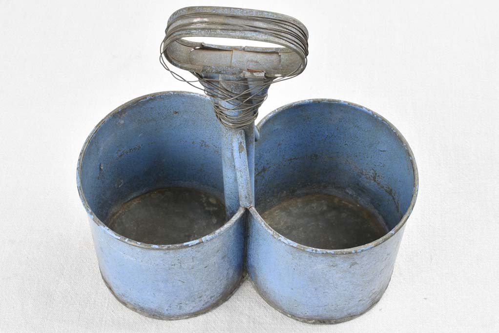 Antique bottle carrier with blue patina