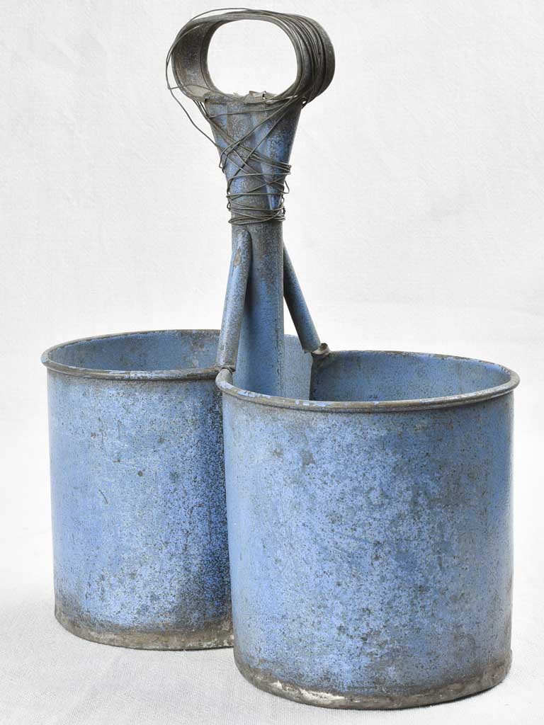 Antique bottle carrier with blue patina