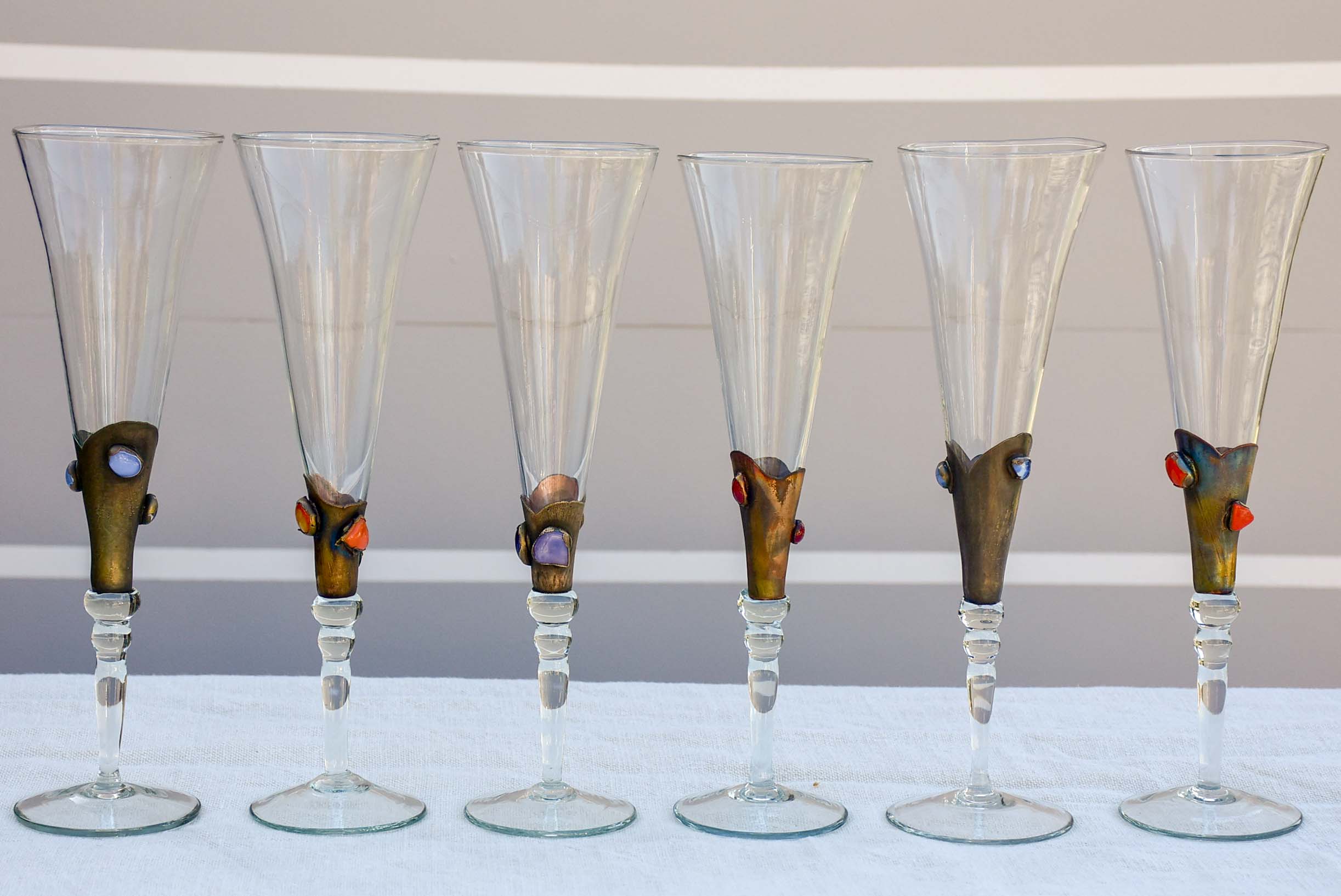 Set of twelve 1950's Murano glass champagne glasses with gemstones