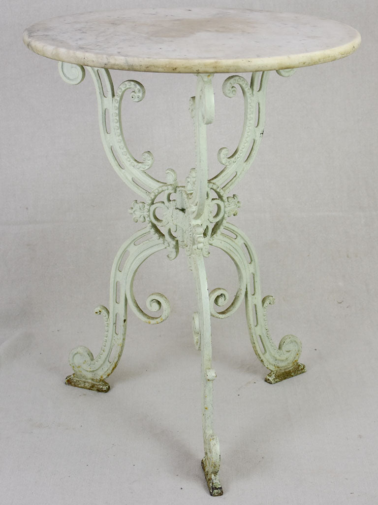 Parisian marble garden table with marble top and cast iron base 21¾" x 28¼"