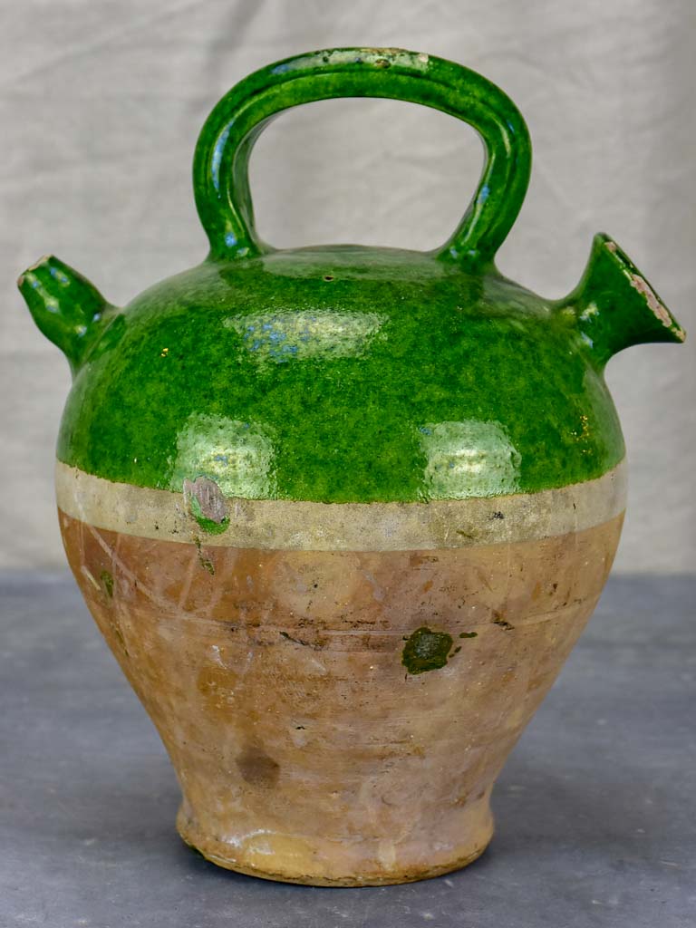 Antique French cruche with green glaze