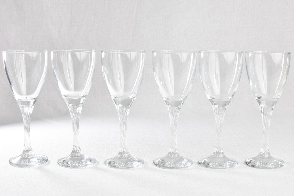 Six wine glasses with twisted stems