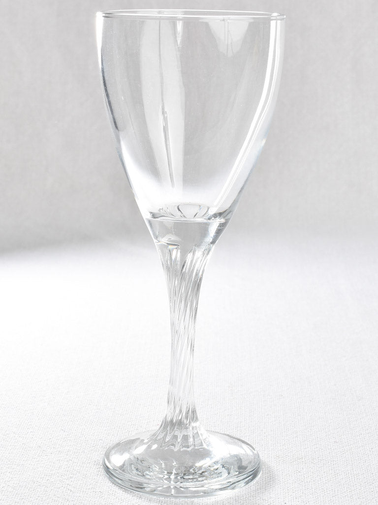 Six wine glasses with twisted stems