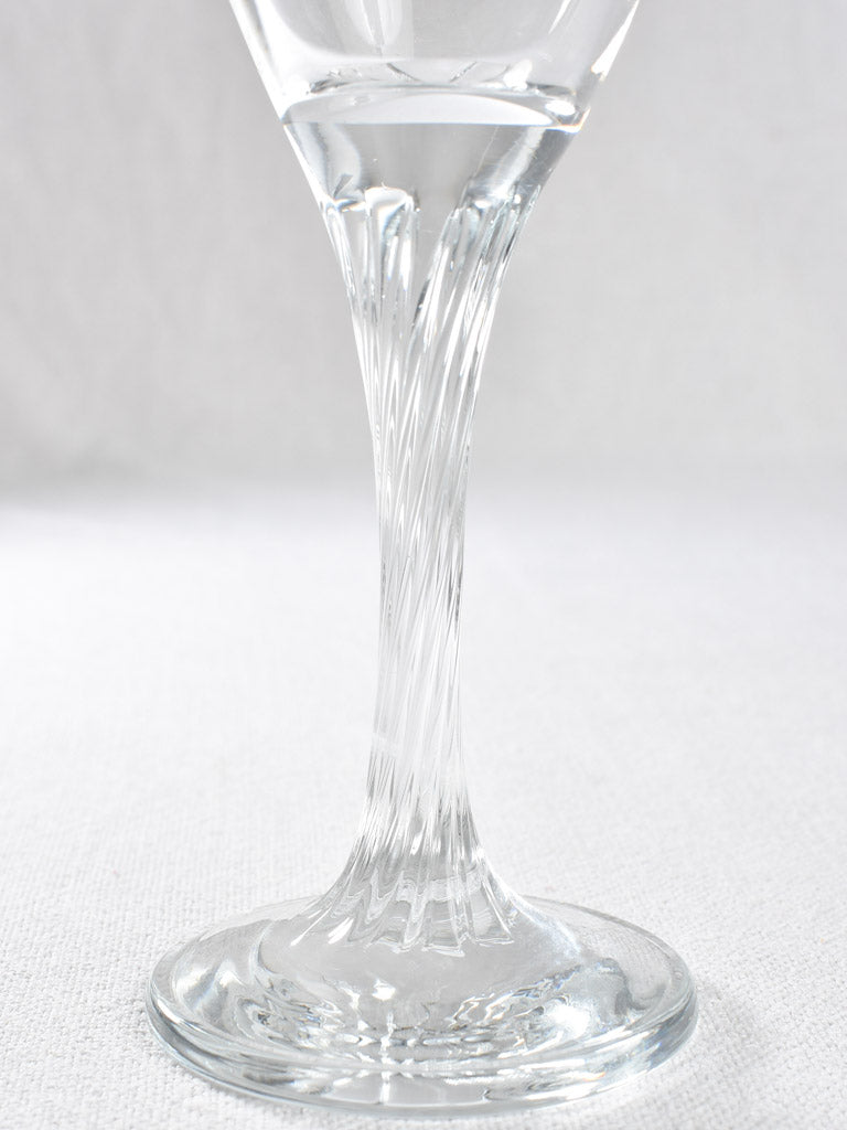 Six wine glasses with twisted stems