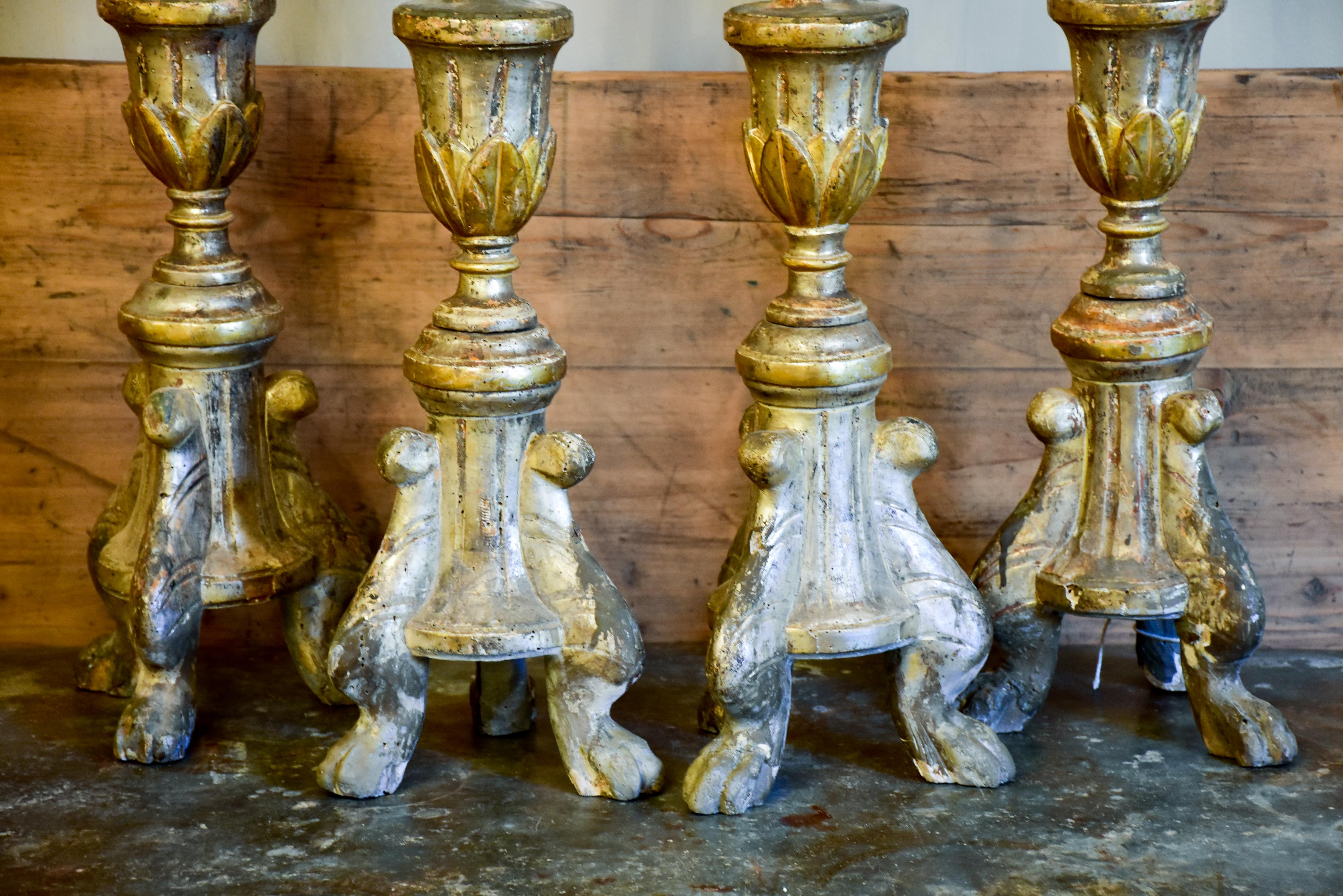 Four large antique Italian church candlesticks