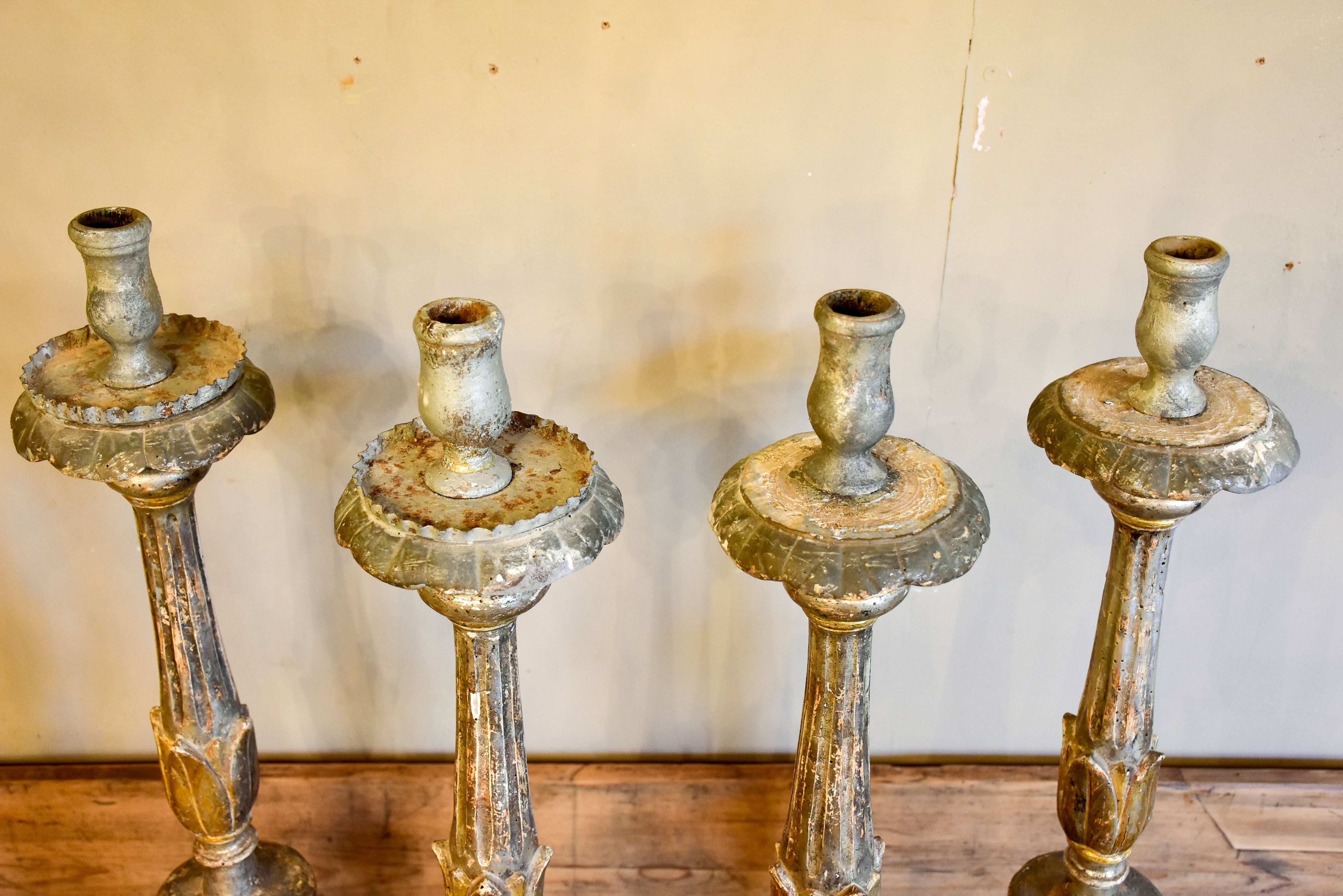 Four large antique Italian church candlesticks