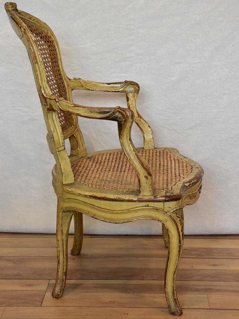 Original 18th Century French provincial armchair with rattan seat and original patina