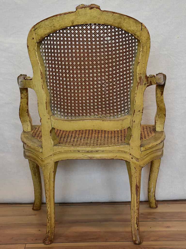 Original 18th Century French provincial armchair with rattan seat and original patina