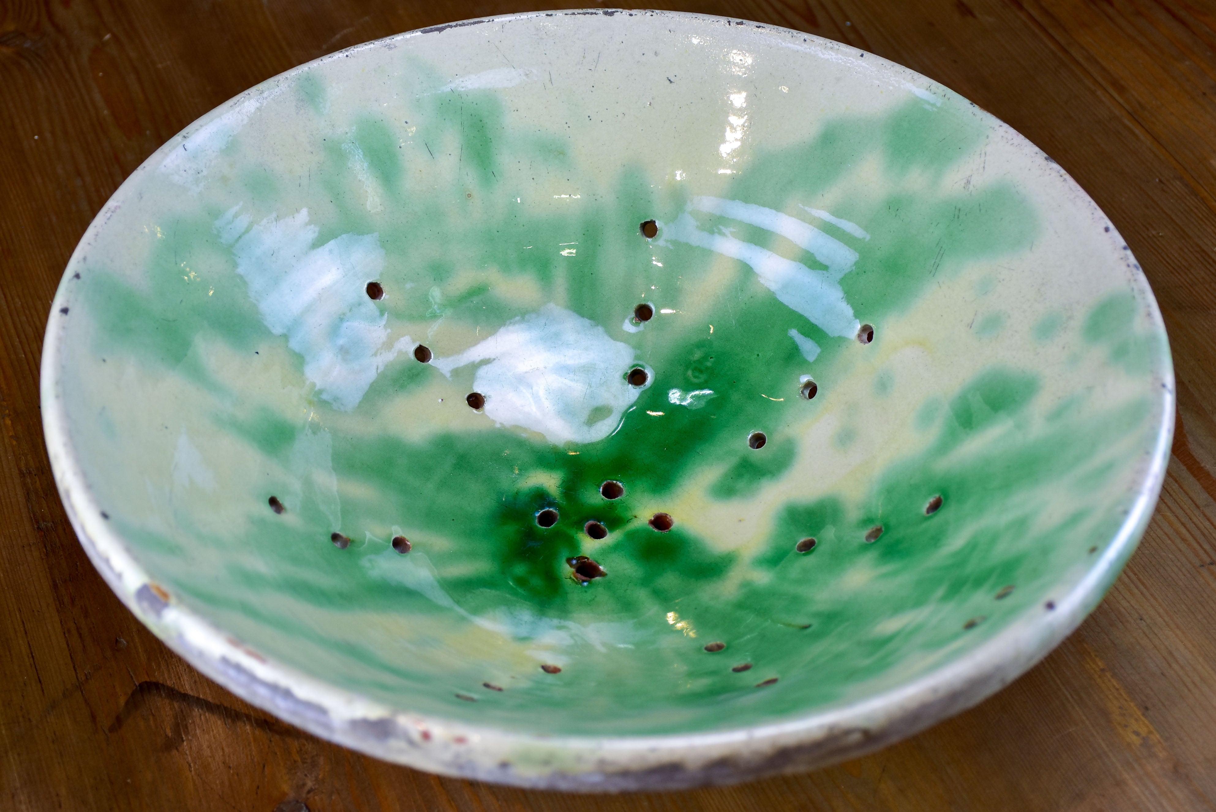 Antique fruit bowl with drainage holes