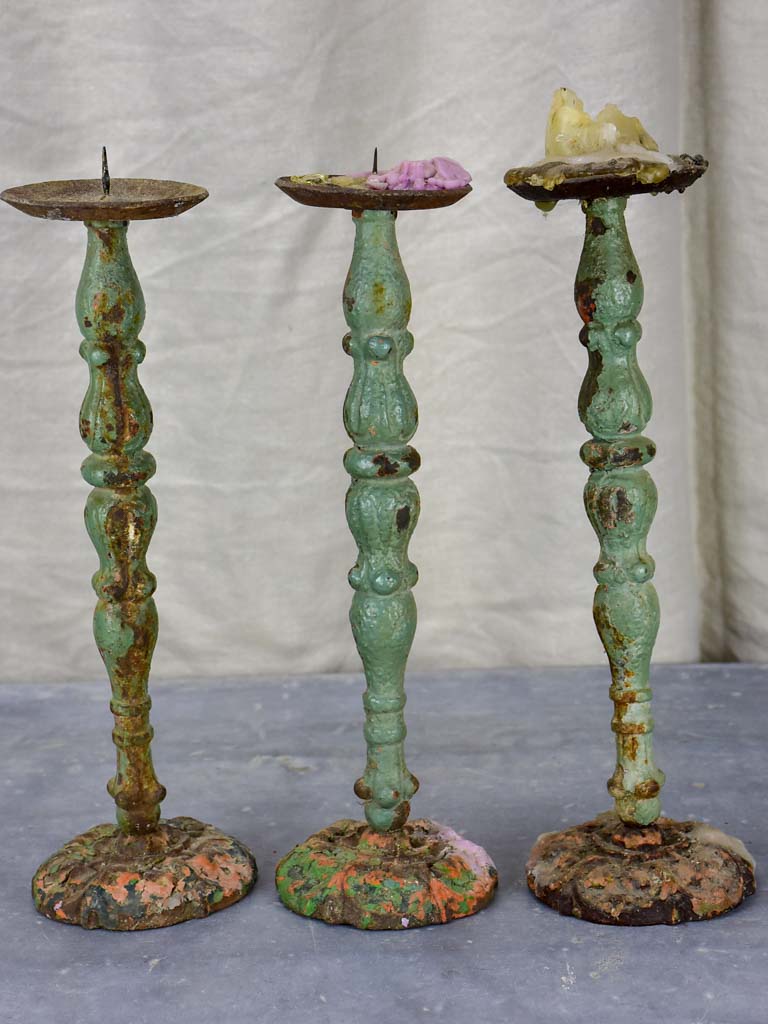 Three antique French candlesticks made from salvaged spindles