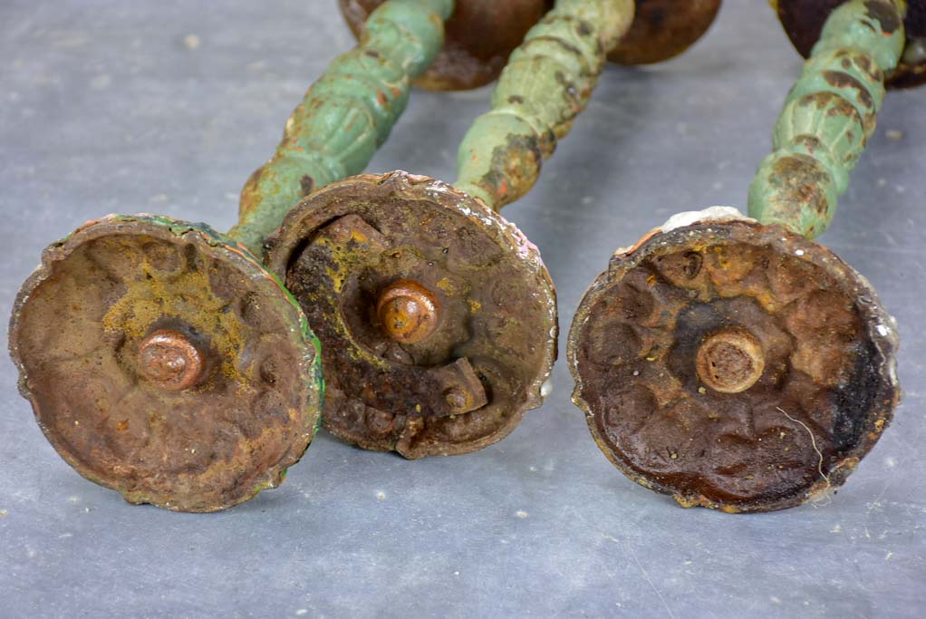 Three antique French candlesticks made from salvaged spindles