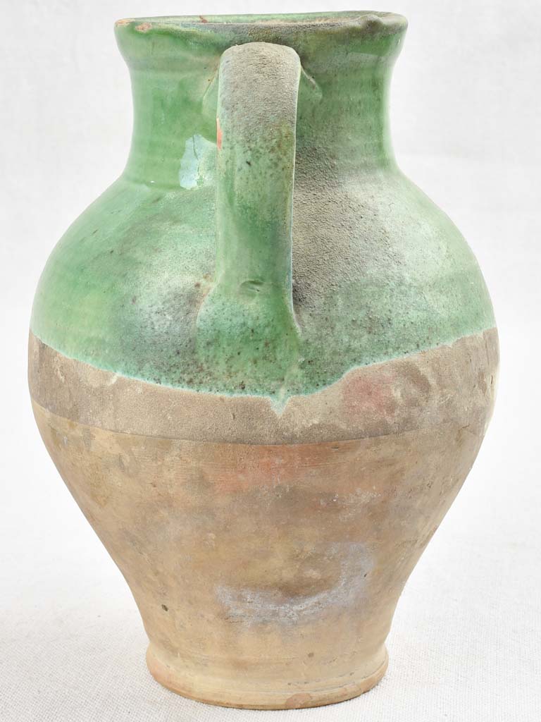 Vintage terracotta pitcher with green glaze 9"