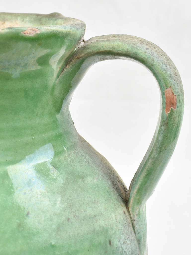 Vintage terracotta pitcher with green glaze 9"