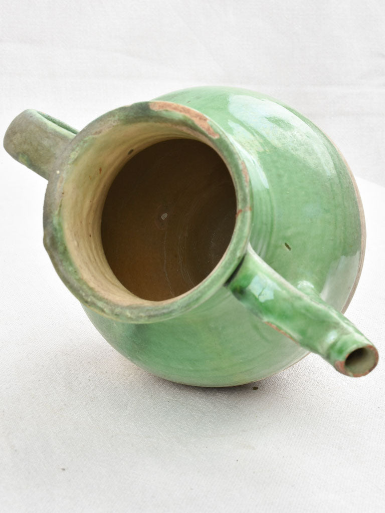 Vintage terracotta pitcher with green glaze 9"