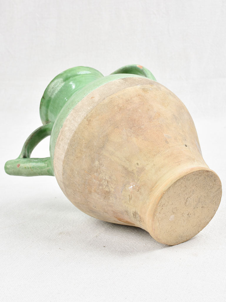 Vintage terracotta pitcher with green glaze 9"