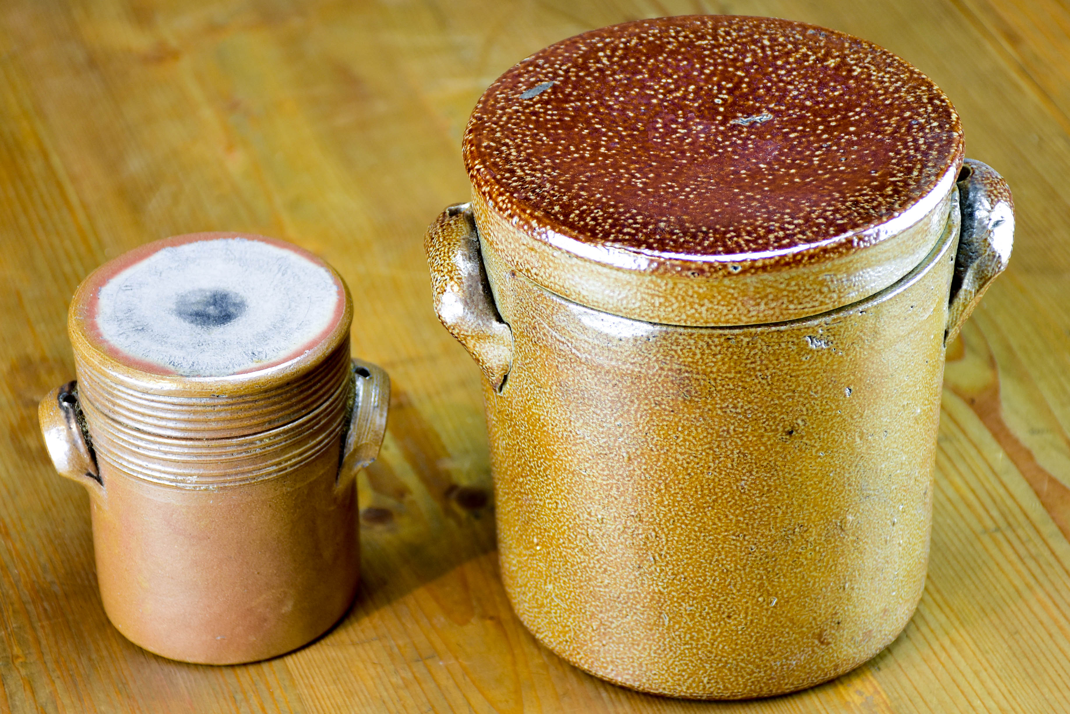 Two stoneware preserving jars with lids - 1950's