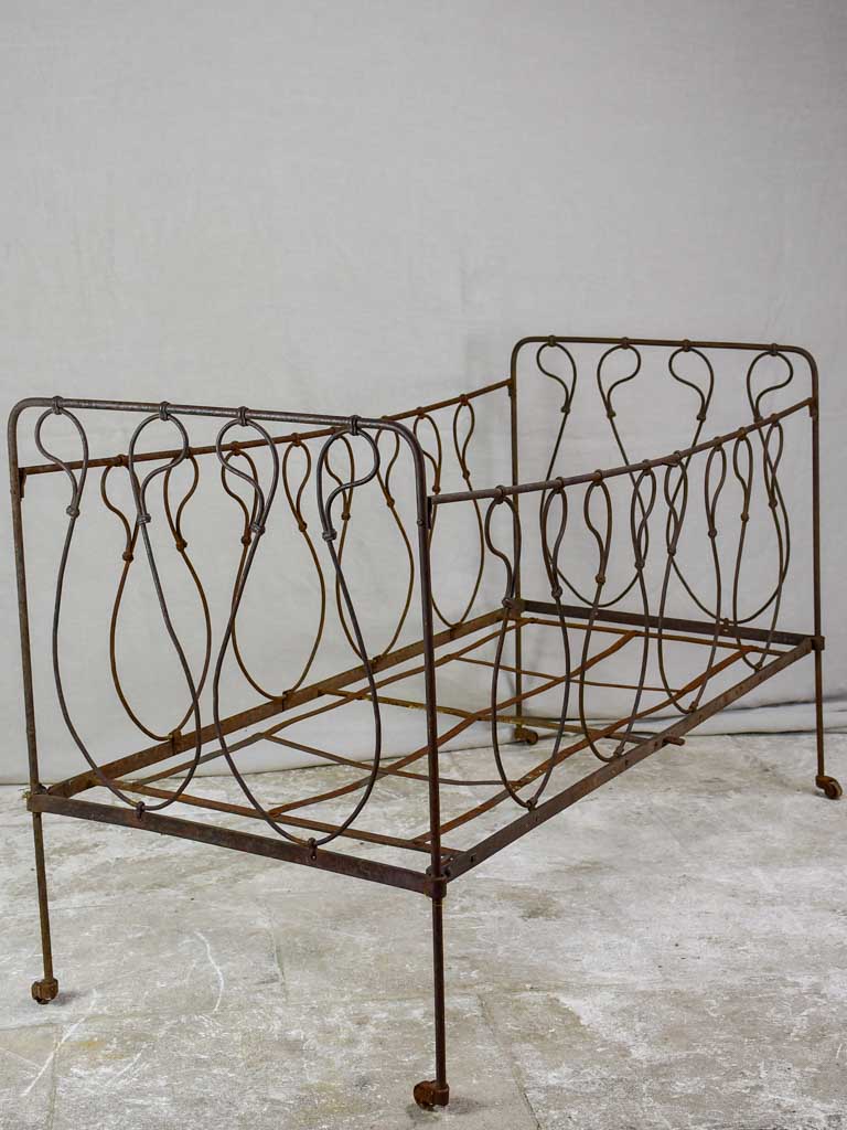 Antique French children's wrought iron bed