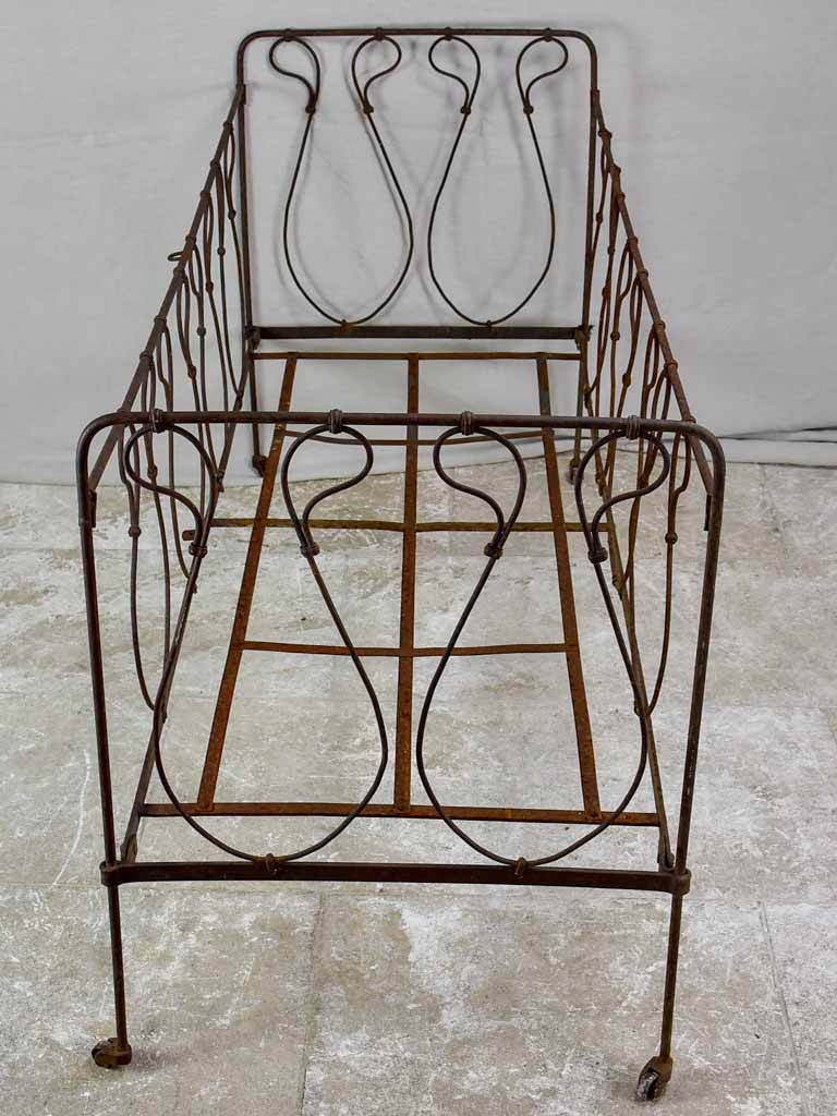 Antique French children's wrought iron bed