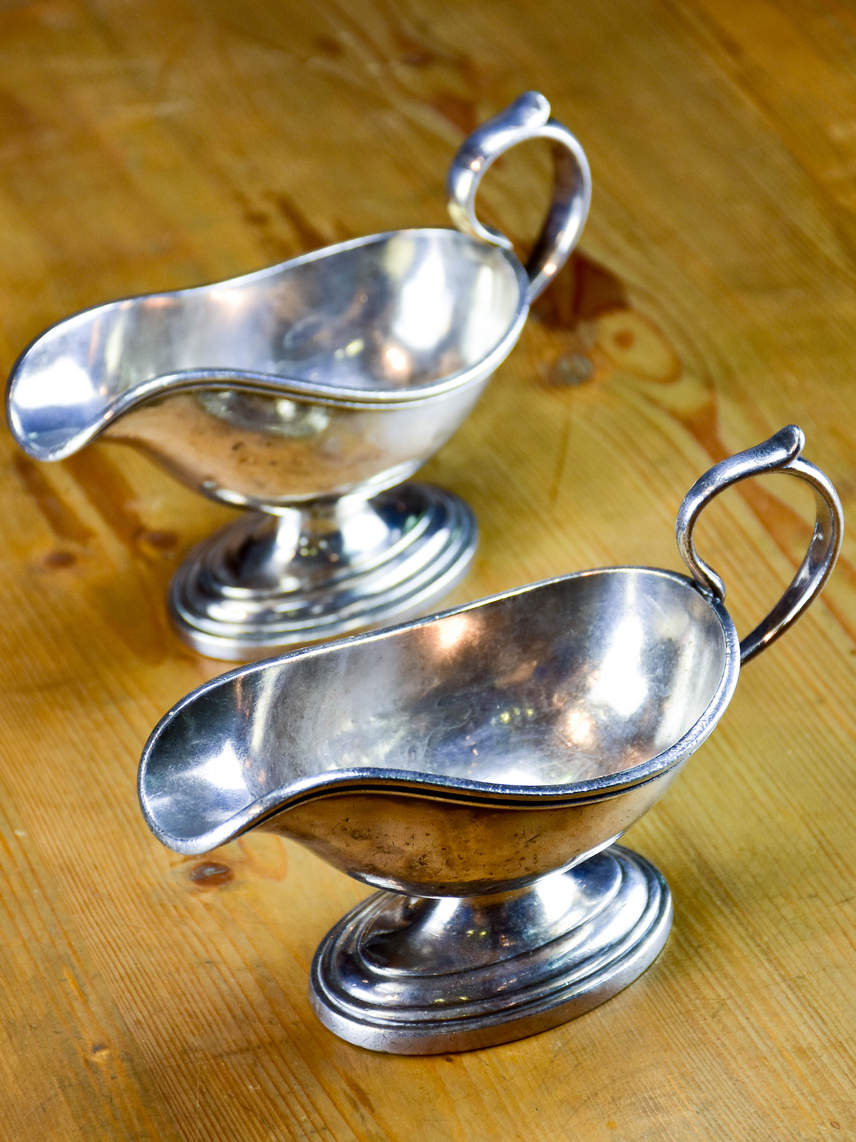 Two antique French sauce boats with monogram