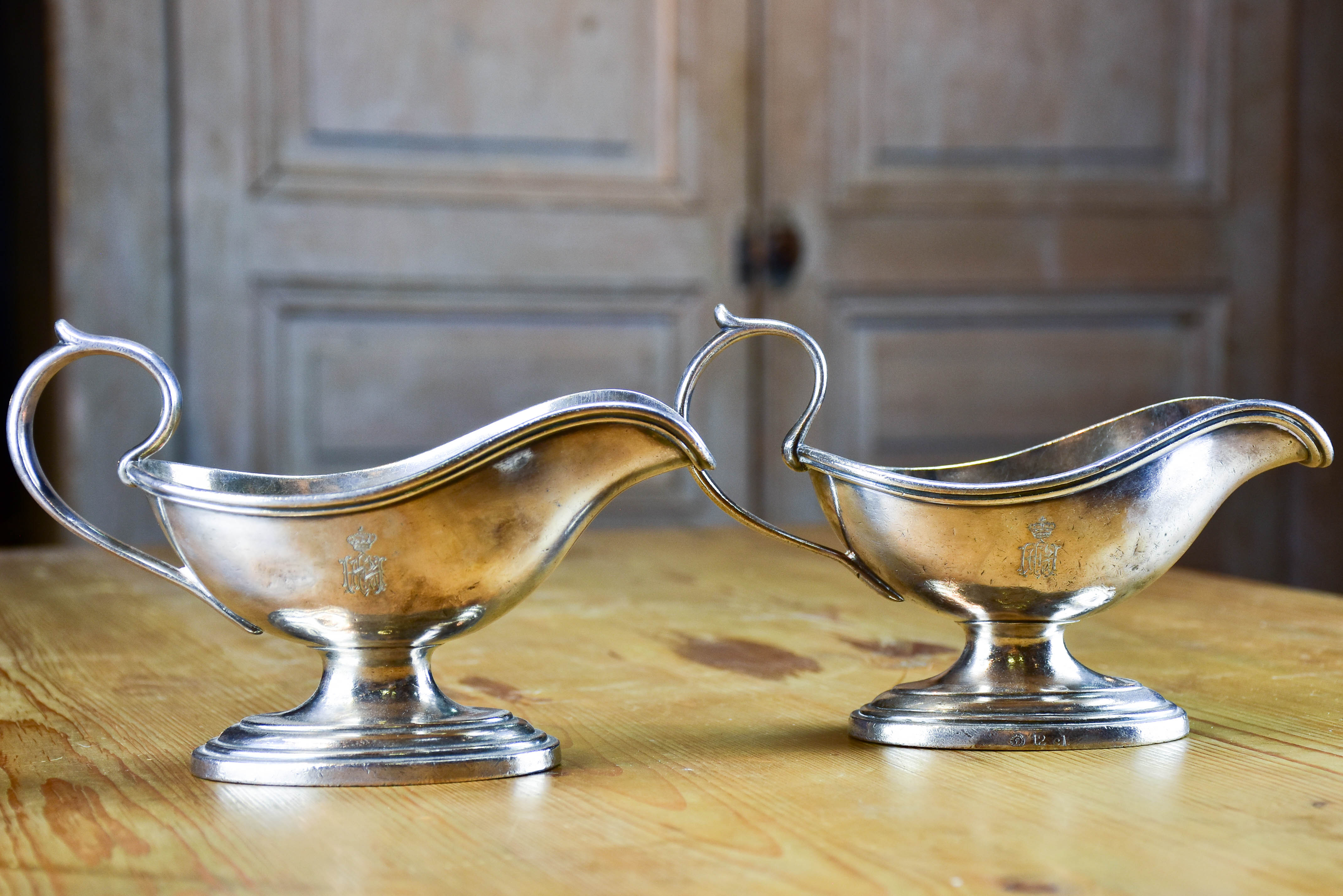 Two antique French sauce boats with monogram