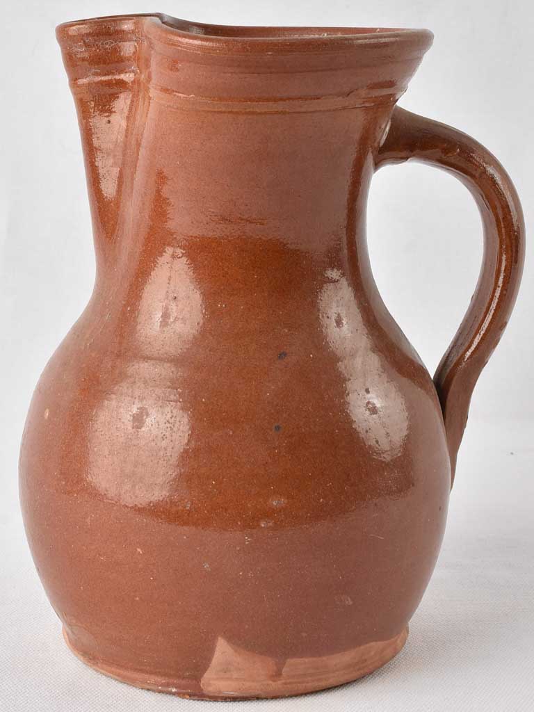 1970s terracotta pitcher w/ brown glaze 9½"