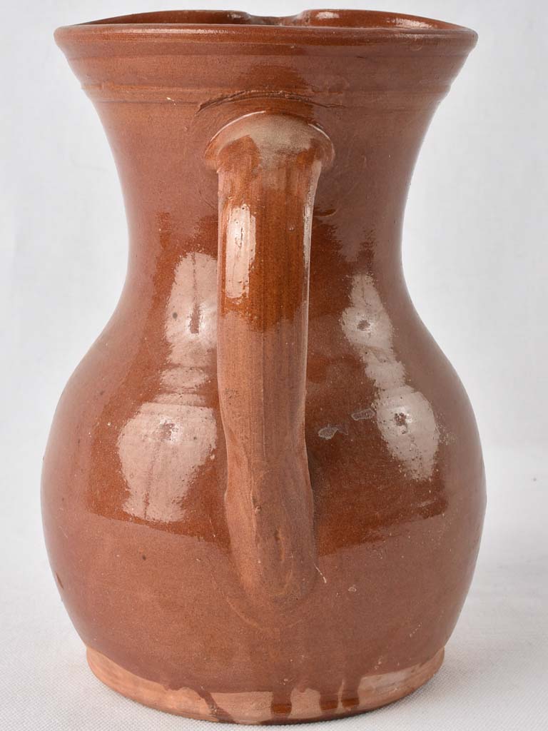 1970s terracotta pitcher w/ brown glaze 9½"